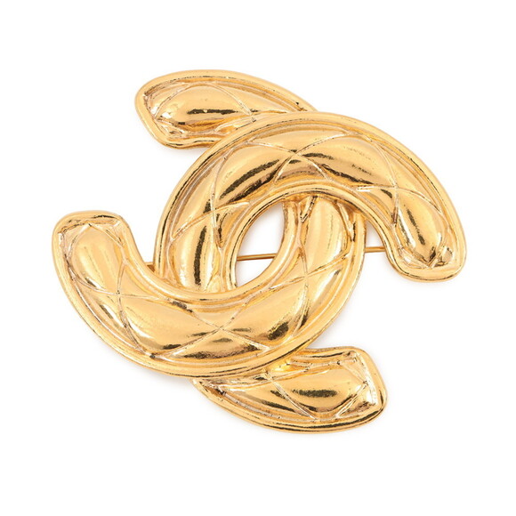 CHANEL Gold Logo Brooch